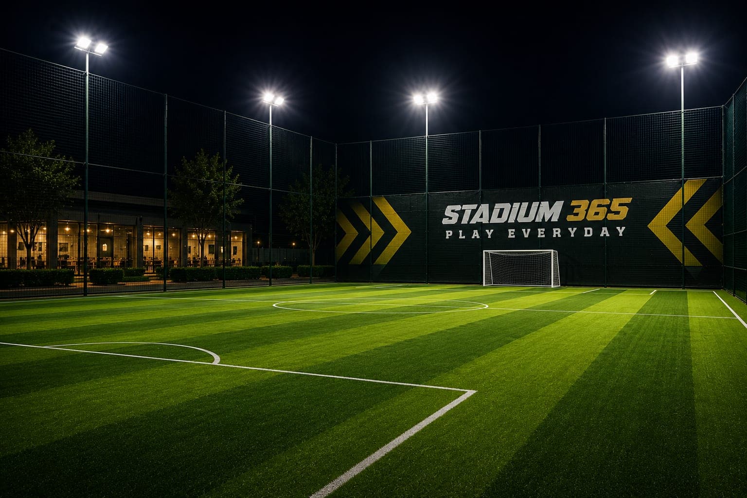 Players competing under floodlights on Stadium 365's turf
